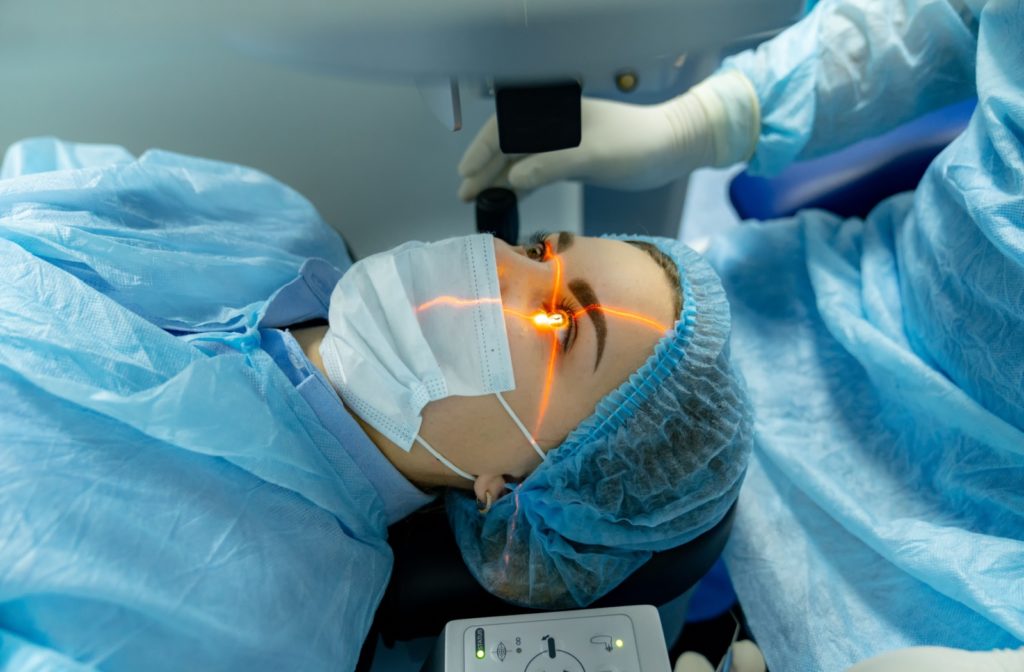 A woman undergoing laser eye surgery.